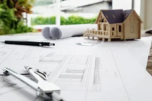 projeto e casa simbolizando engenharia civil ou arquitetura